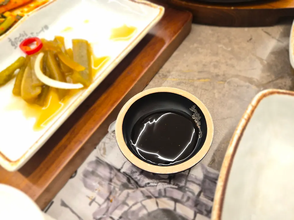 Stone pot rice served with grilled fish