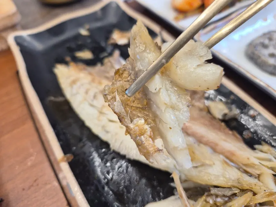 Barley corvina on white rice