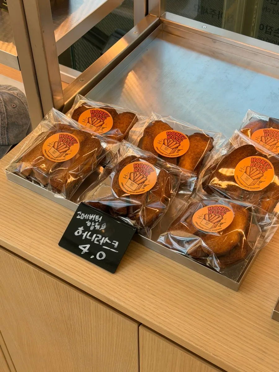 Slice cakes lined up in the display case