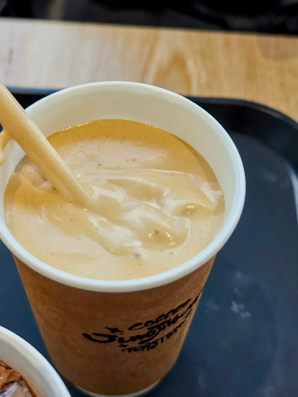 Close-up of the coconut foam on the coffee cup