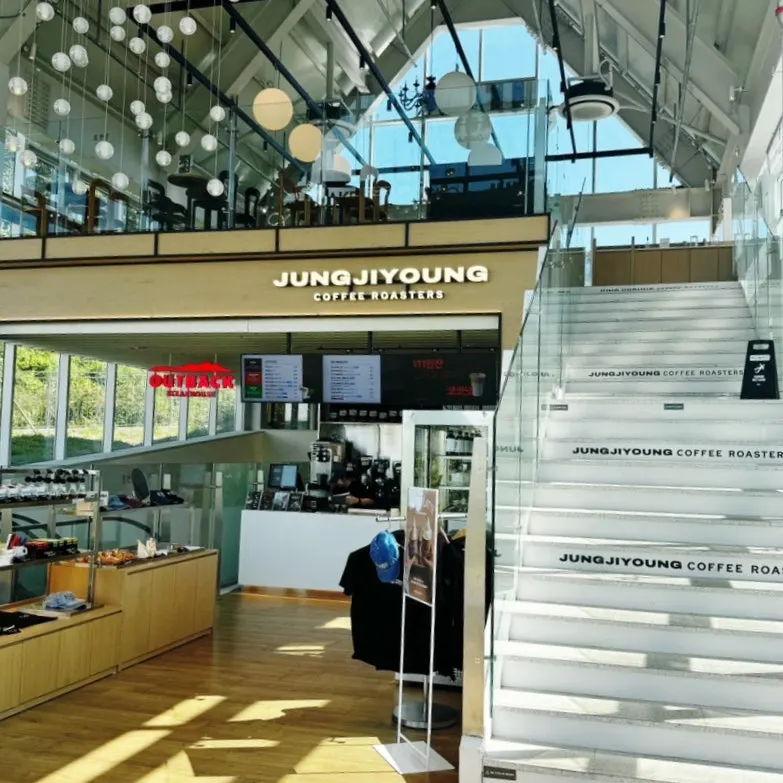 Tables and order counter at the café entrance