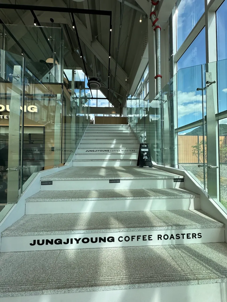 Stairs to the split-level seating beside the counter