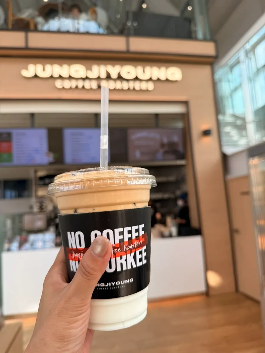 Iced coconut coffee placed by the window wall