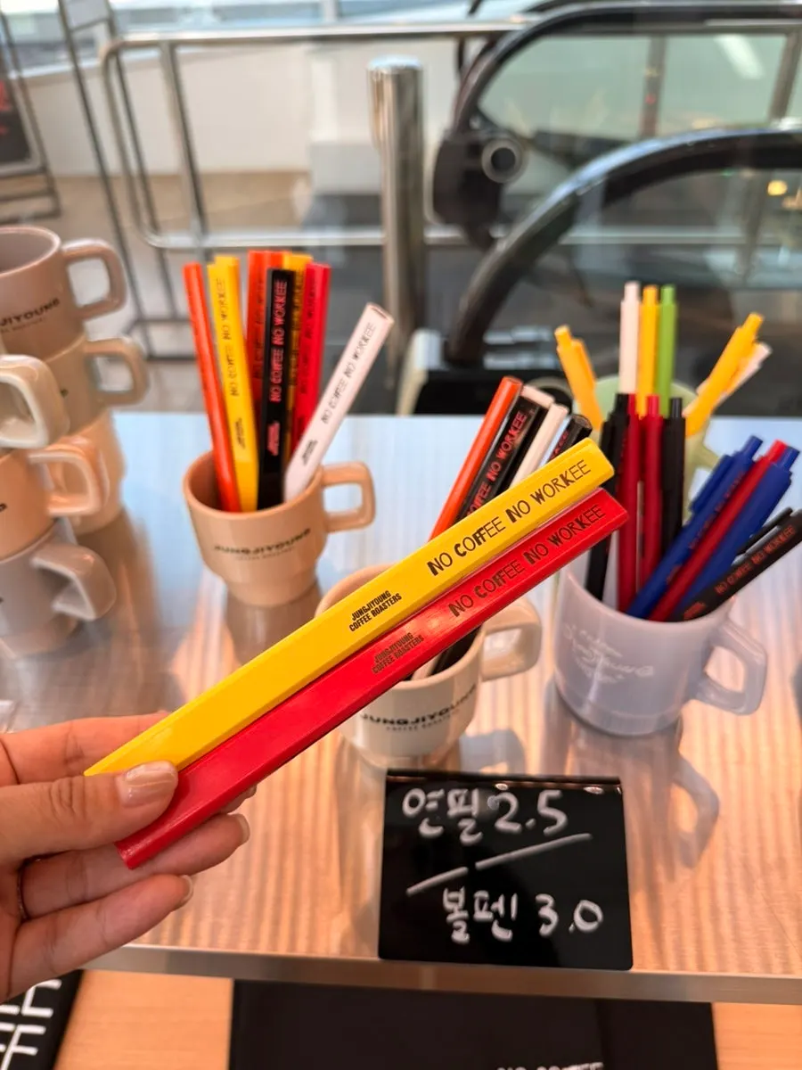 Pencils, pens and other café stationery goods