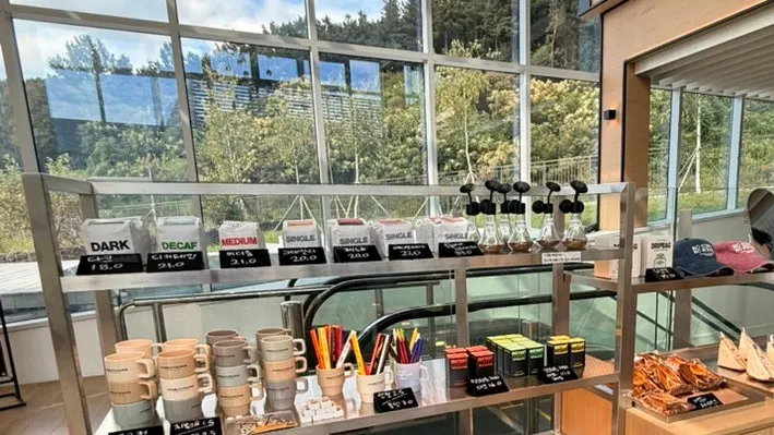 Coffee bean packages for sale on display