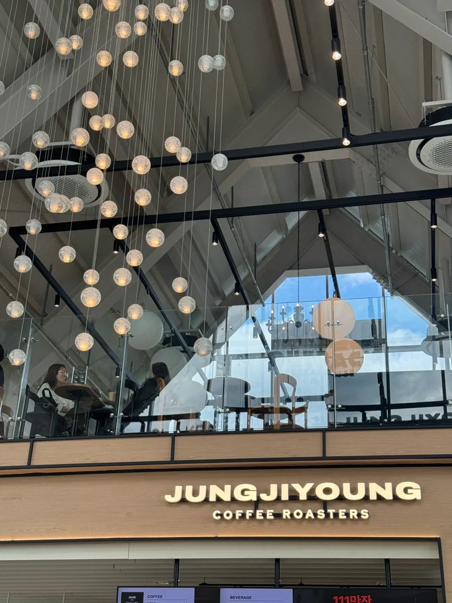 Café interior with a striking triangular roof