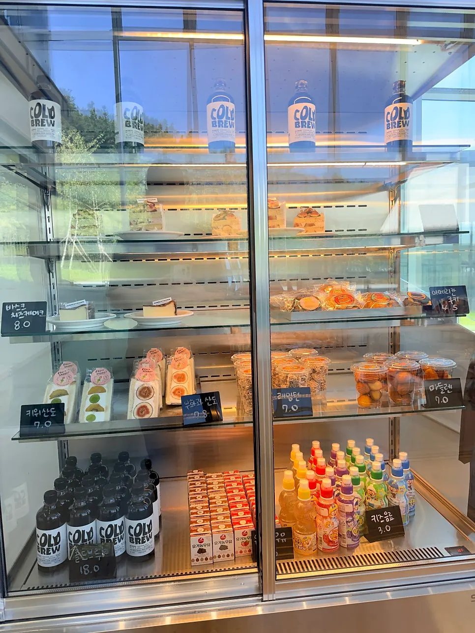 Dessert display case beside the counter