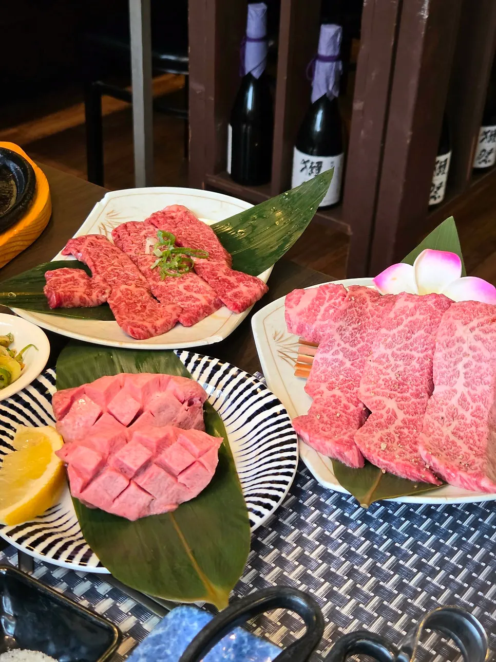 Wagyu premium beef tongue plated with leaves and flowers