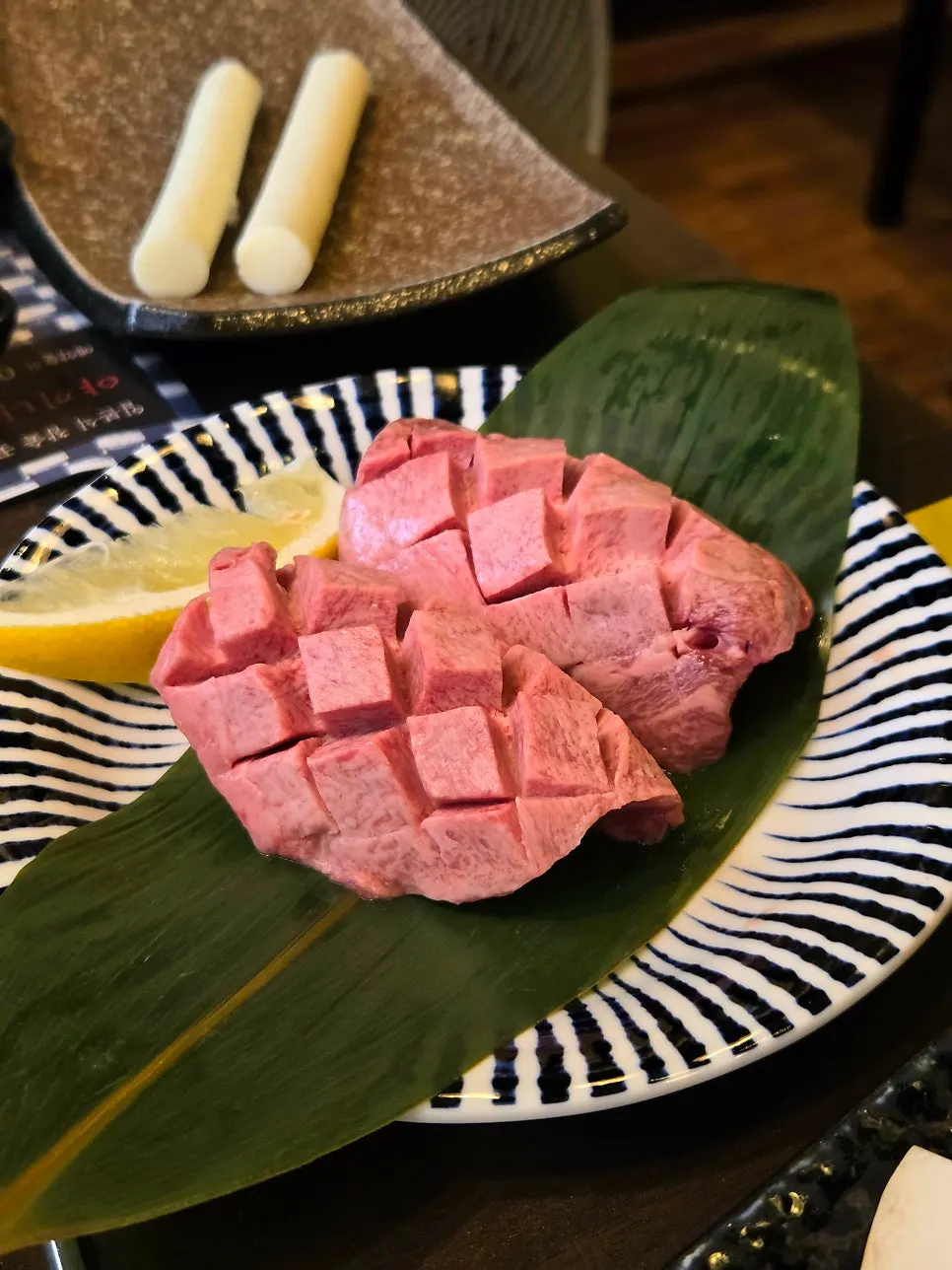 Plate of scored wagyu premium beef tongue