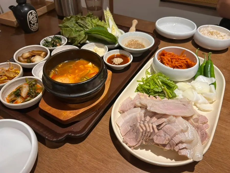 Plate of bossam with pork belly and pork jowl together
