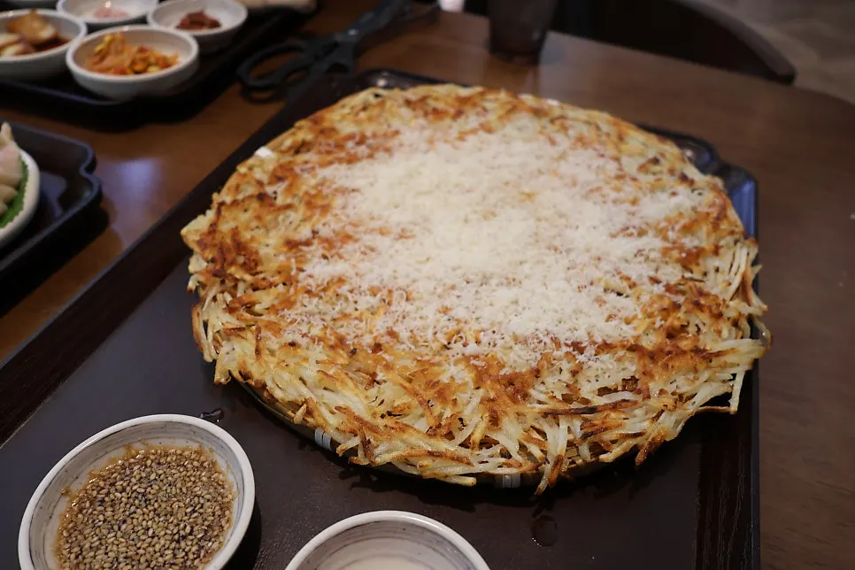 Uldong Bossam's potato pancake topped with cheese