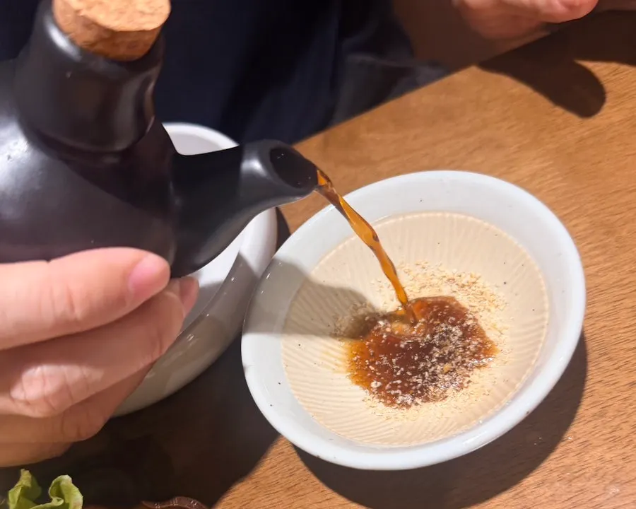 Sesame soy sauce ground in a mini mortar