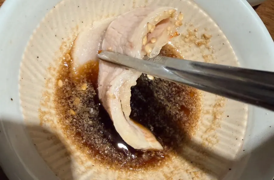 Uldong Bossam pork dipped in sesame soy sauce