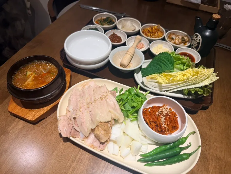 Boiled pork portioned out for sharing with a child