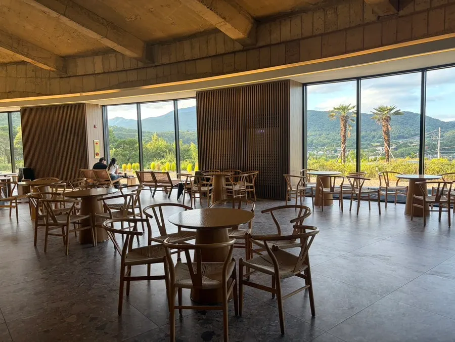 Spacious wood-toned interior at MUG