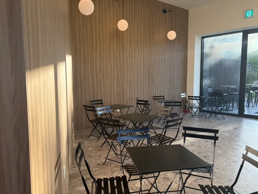 Water feature reflecting the sky and clouds
