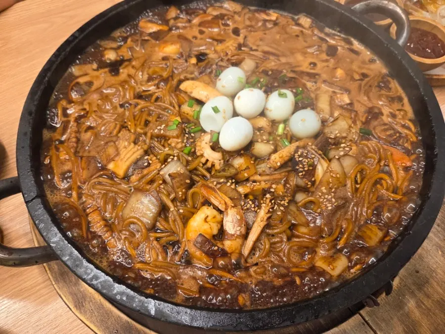 Table with stone-plate jjajang and the handmade dontang and chitang set