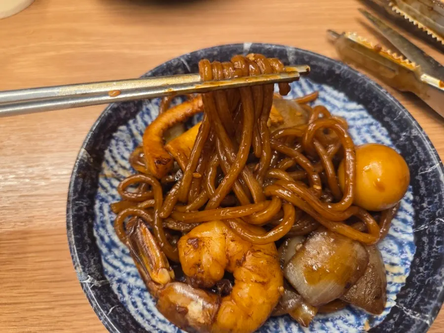 Stone-plate jjajang topped with chunky seafood