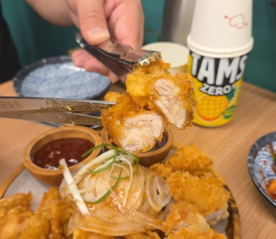 Piece of chitang dipped in sauce
