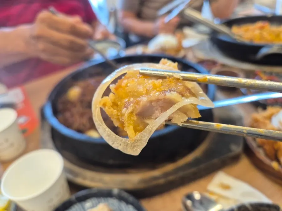 Scorched rice soaked in broth at the bottom of the dol jjamppong