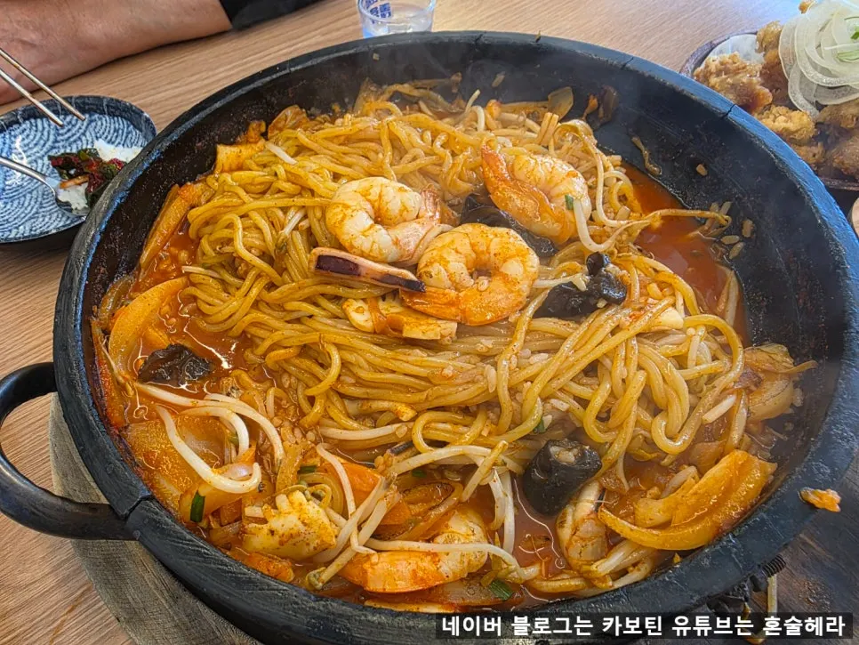 Shrimp and seafood piled into the stone-plate jjamppong