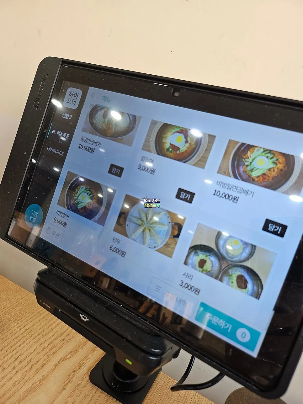 Order tablet and card reader on each table
