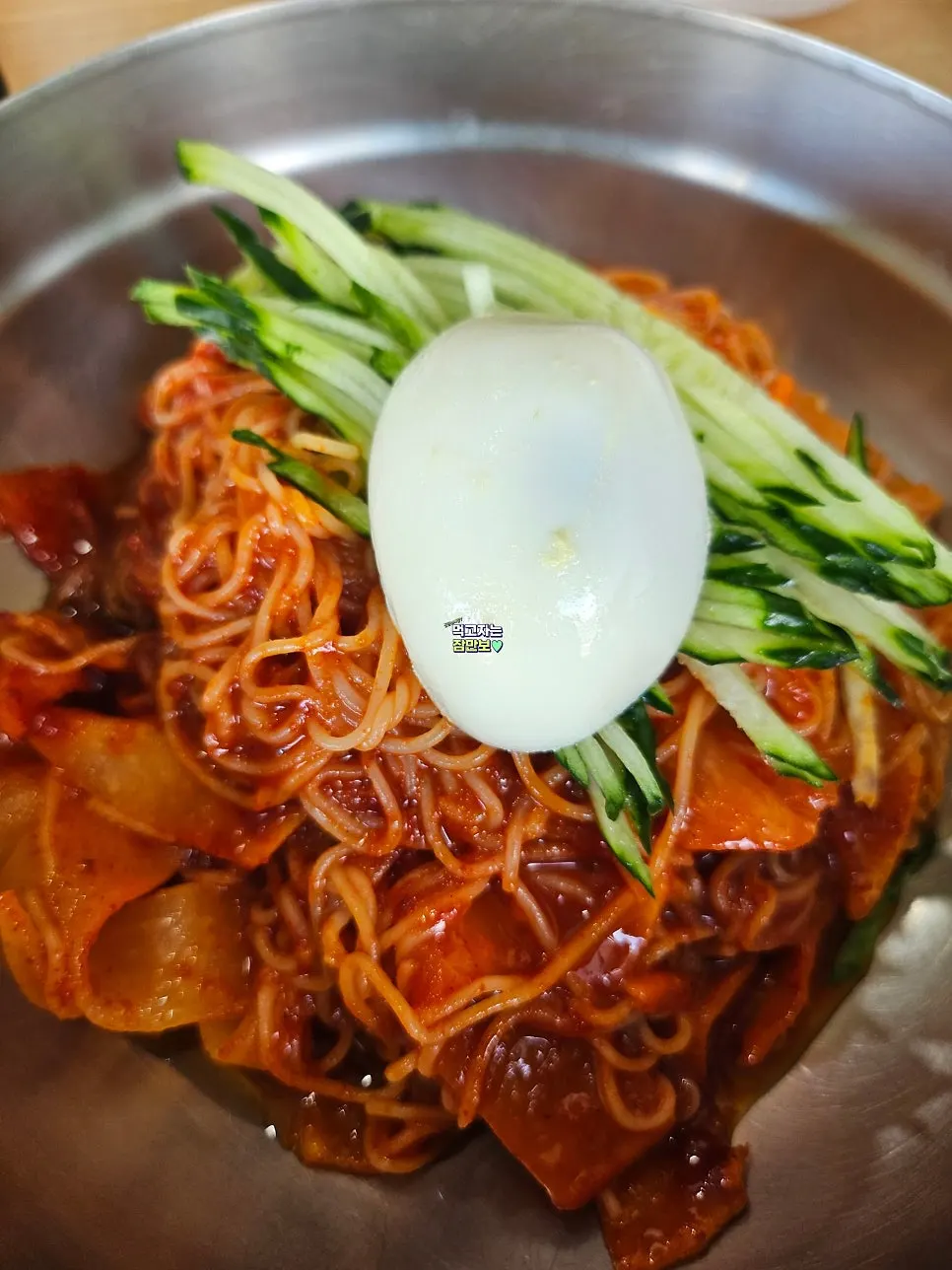 Close-up of the refreshing water milmyeon broth