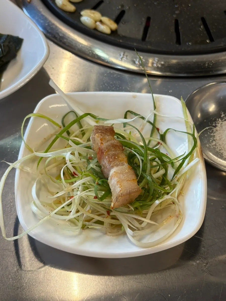 Black pork wrap with banga leaves