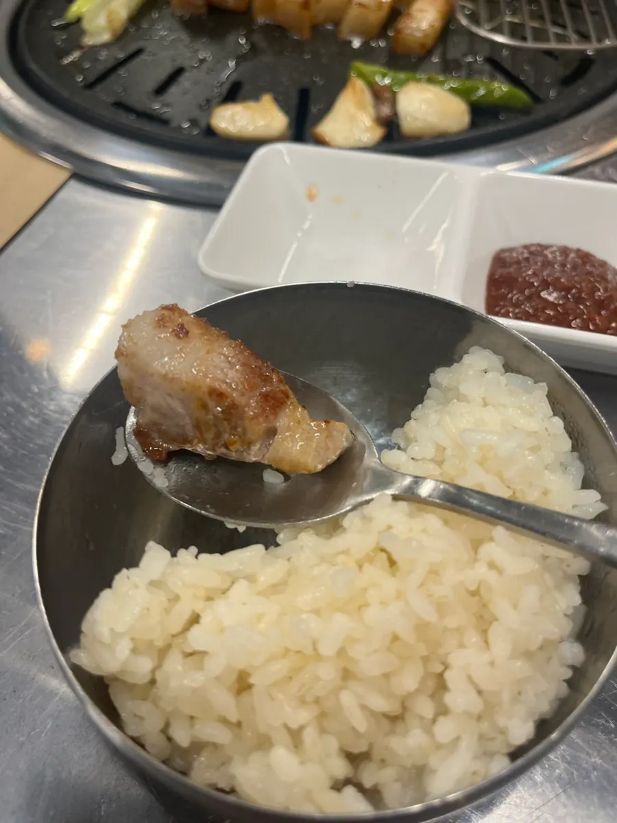 Sliced pieces of grilled black pork belly