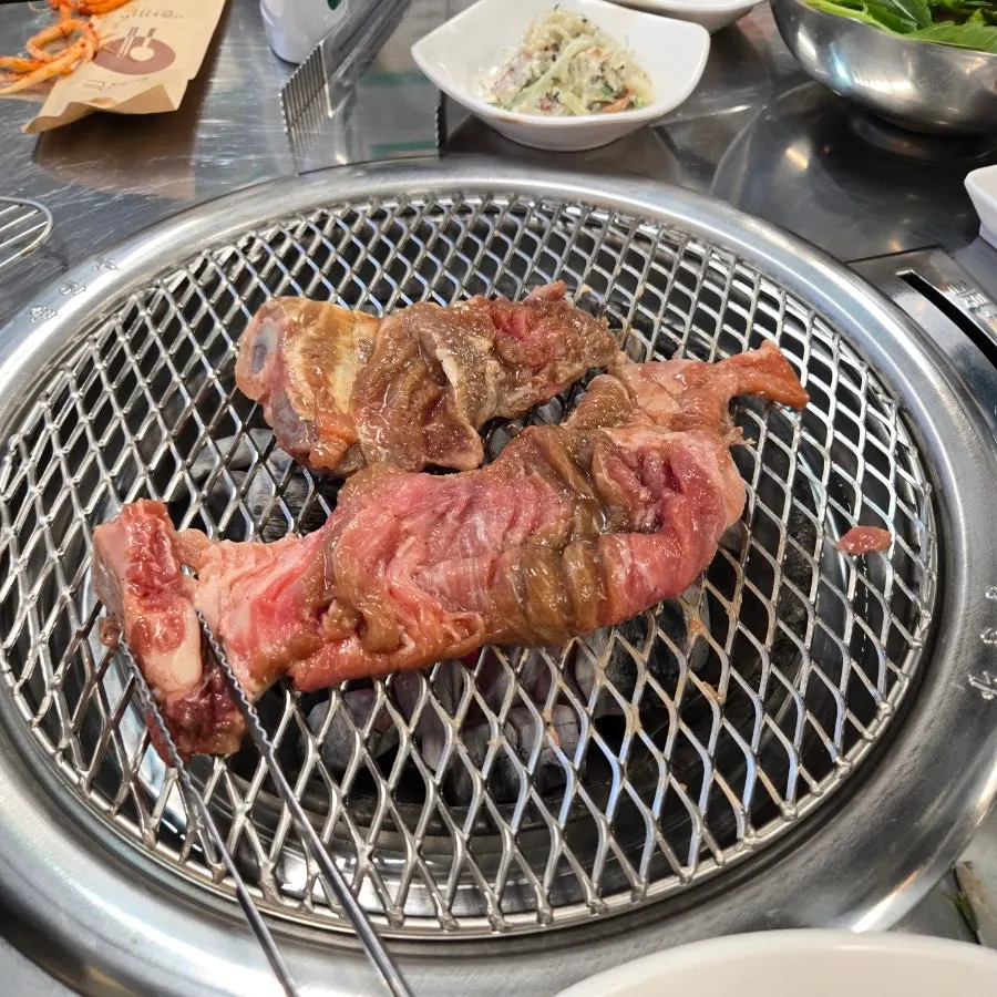 Marinated ribs placed on the charcoal grill