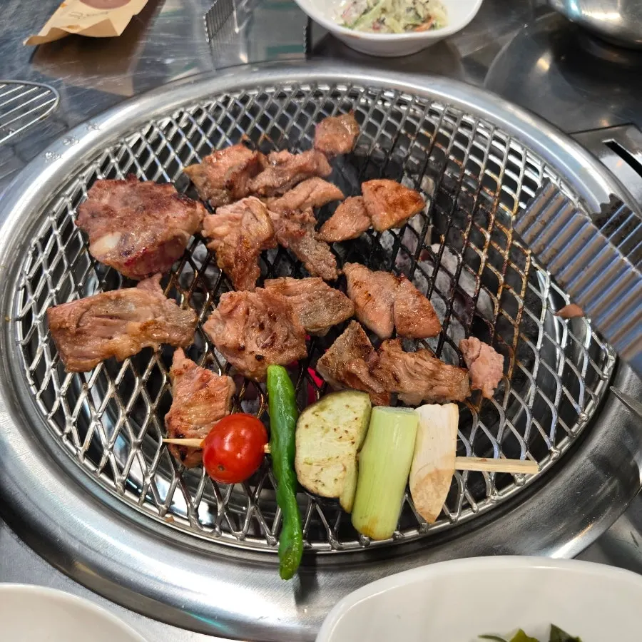 A fully cooked piece of marinated rib