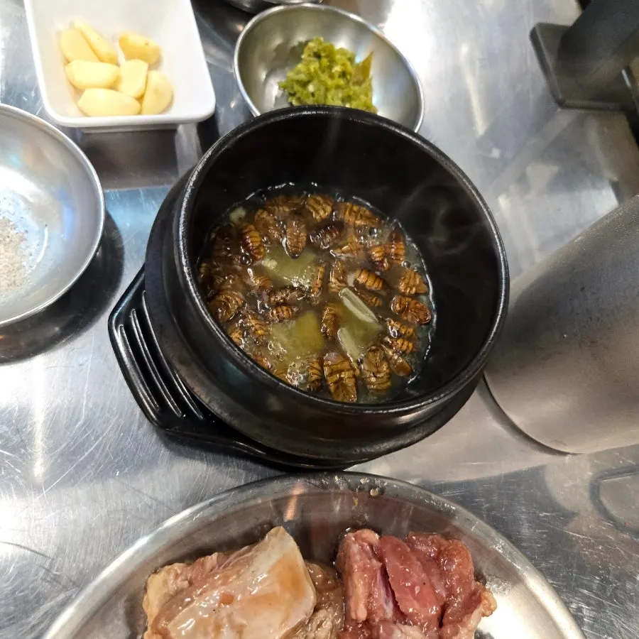Silkworm pupa soup packed with pupas