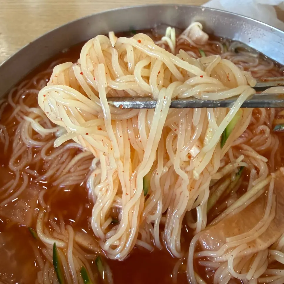 Water milmyeon topped with a generous piece of meat