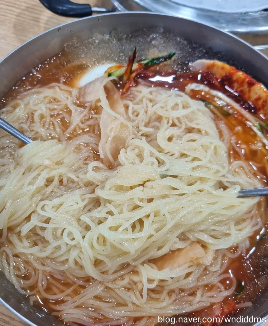 Noodles lifted up with chopsticks