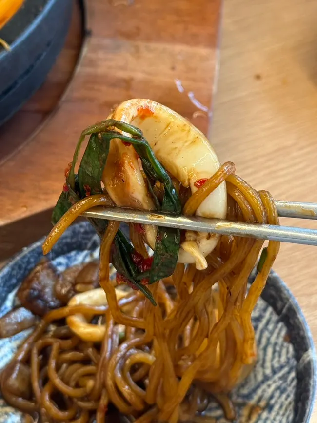Dol jjajang mixed with quail eggs on top