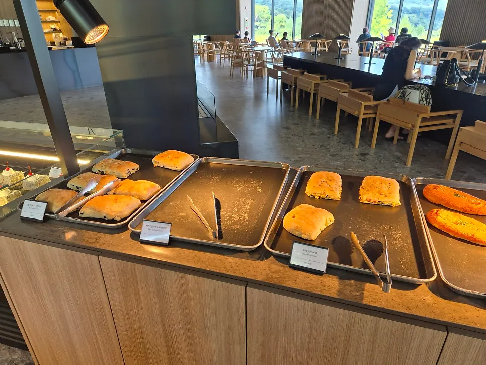 Lemon, apple, and blueberry cinnamon rolls displayed at MUG