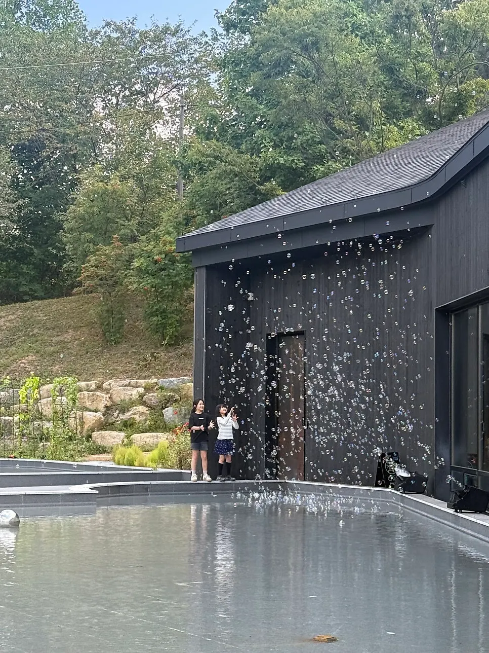 MUG's front entrance with bubbles