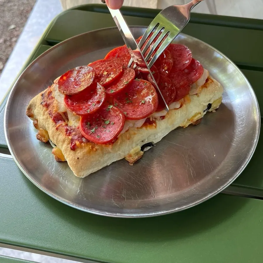 Desserts and coffee set on an outdoor table