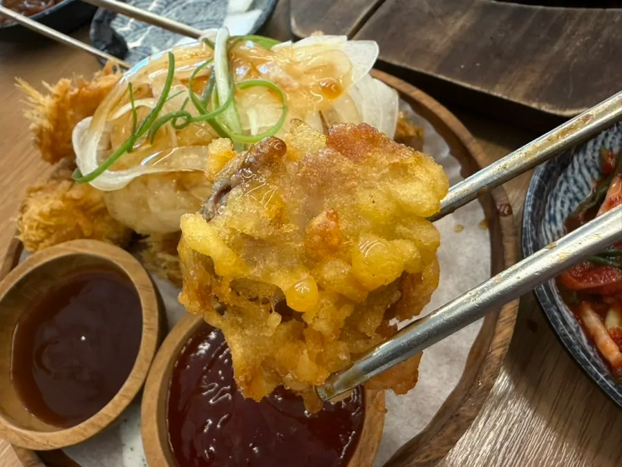 Jjajang sauce loaded with shrimp, squid, and quail eggs