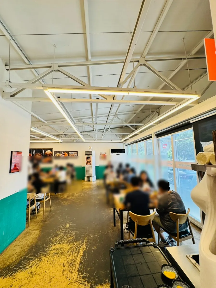 Spacious dining hall split around a central area