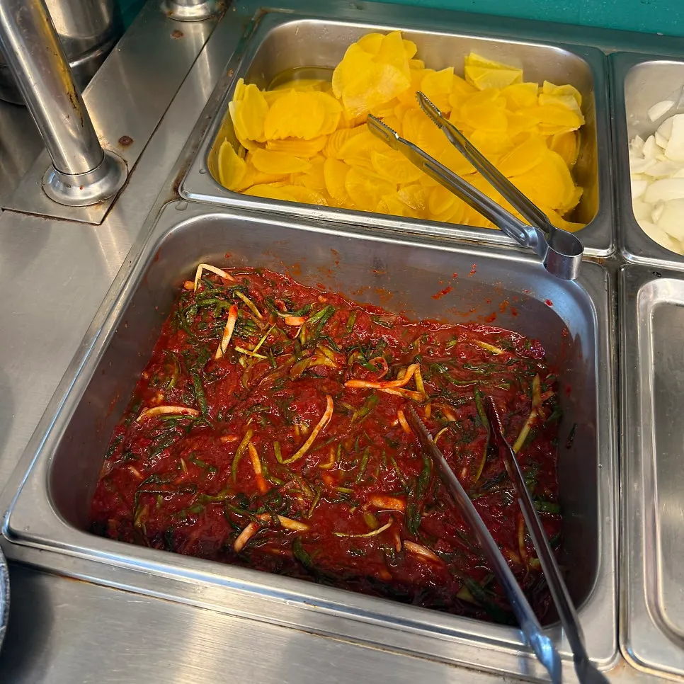 Green onion kimchi prepared at the self-serve bar