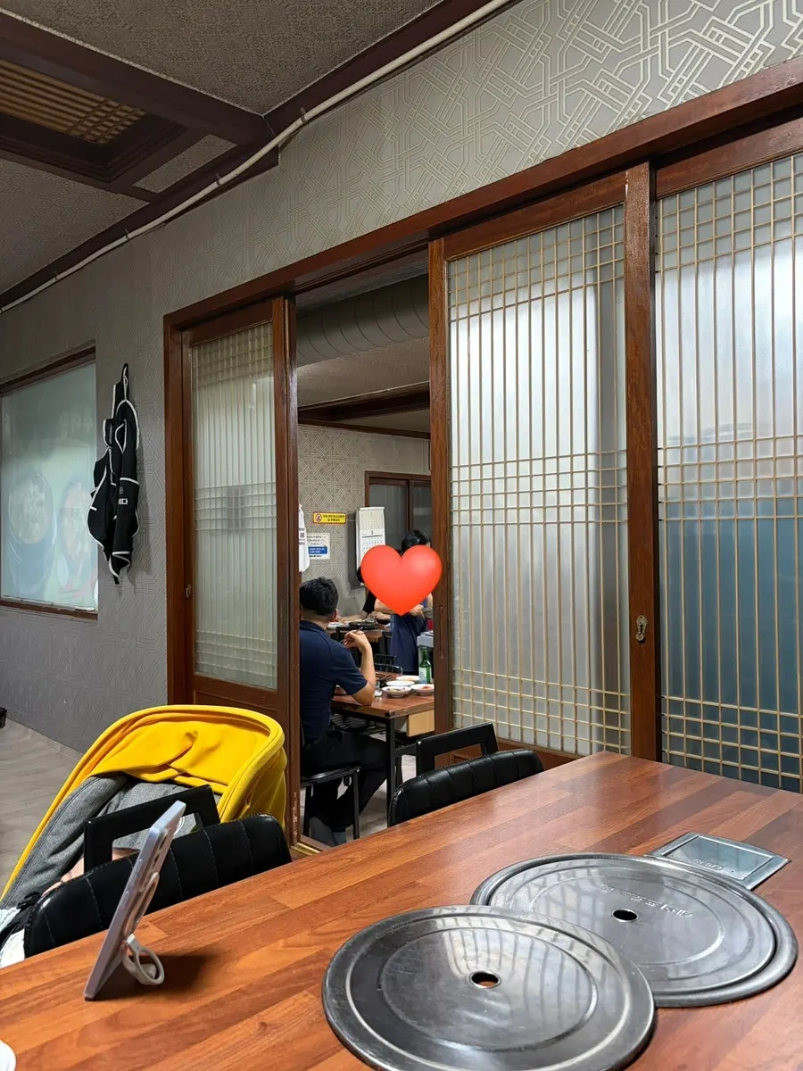 Interior of the Korean restaurant seen through the doorway