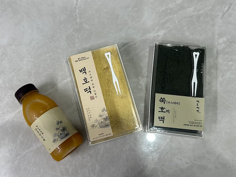 Takeout box from Baekho Tteokbang brought home