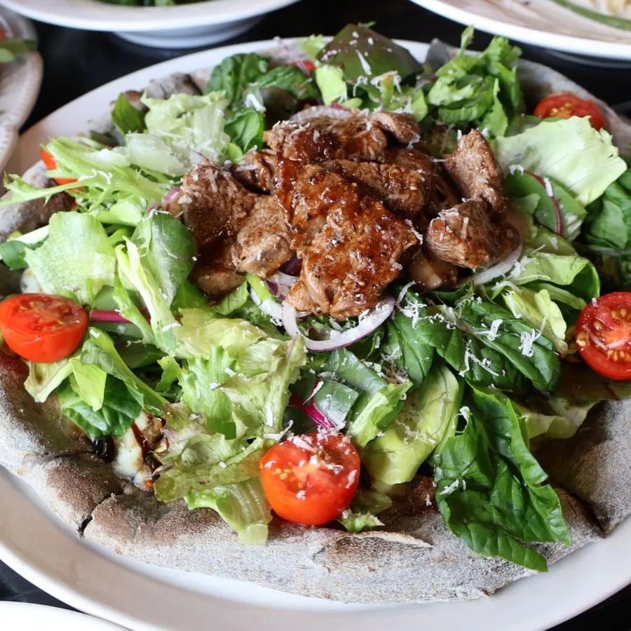 Signature tenderloin steak pizza
