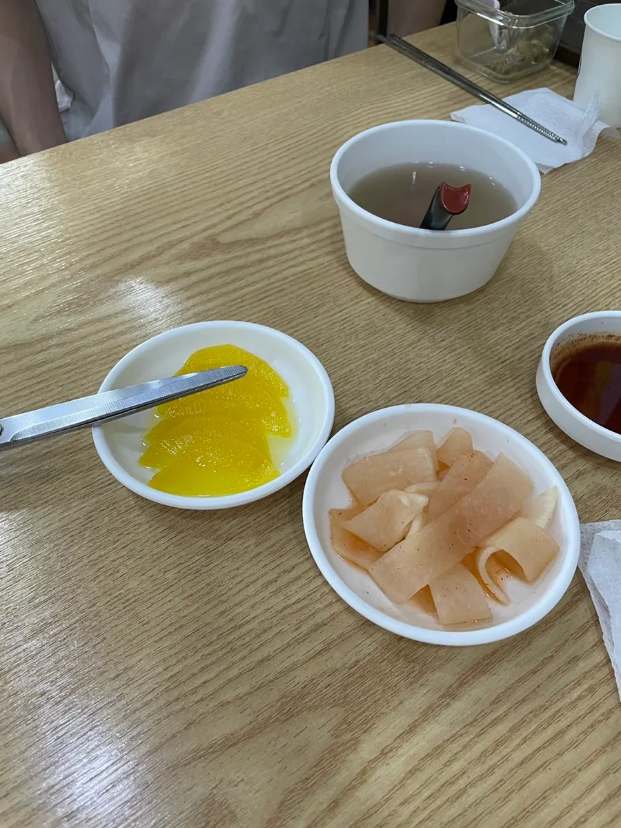 Pickled radish and radish salad side dishes served first
