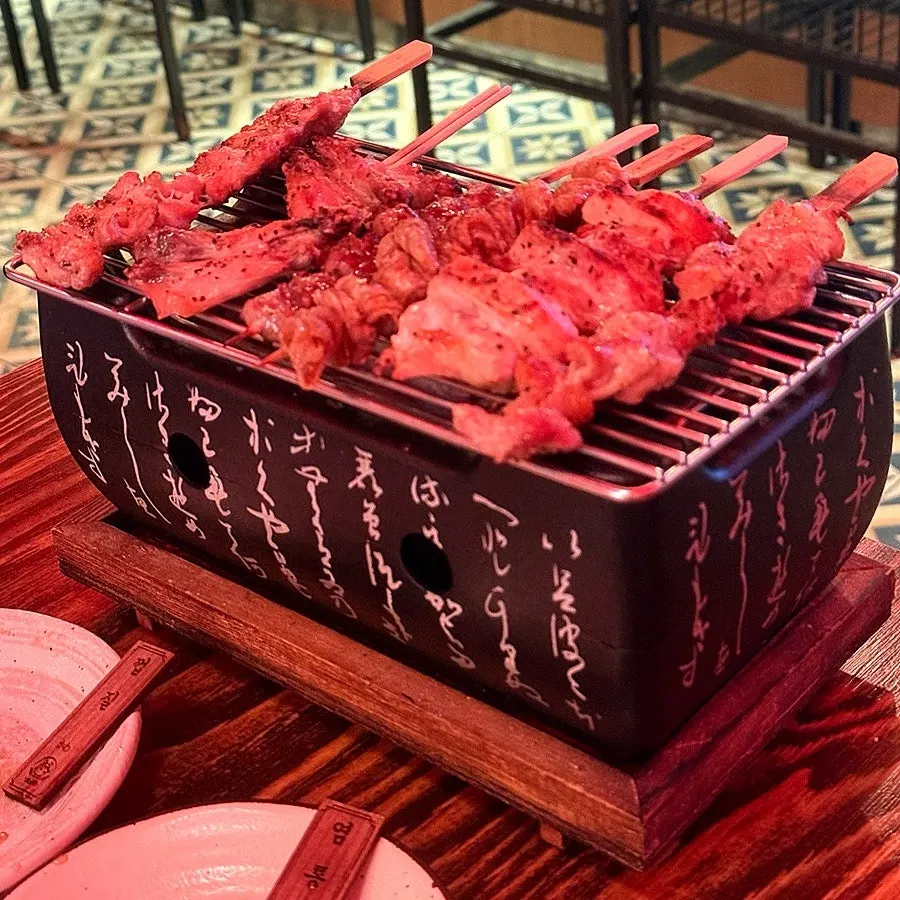 Yakitori served with a tabletop brazier