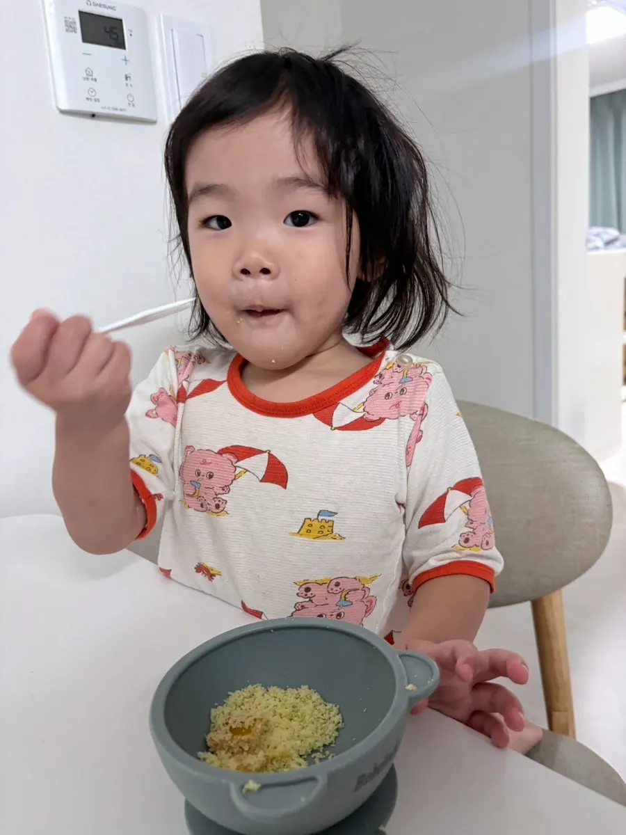 Pumpkin injeolmi shared with a child