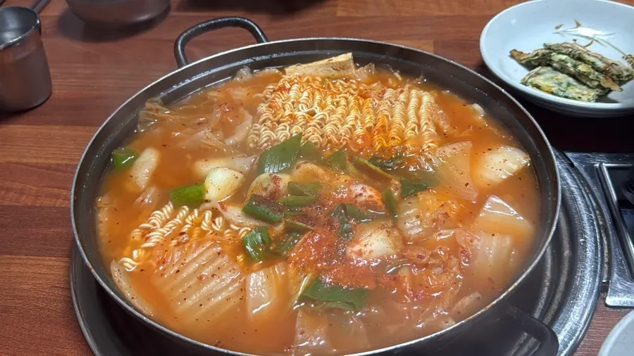 Ramen noodles soaked in spicy pork stir-fry sauce
