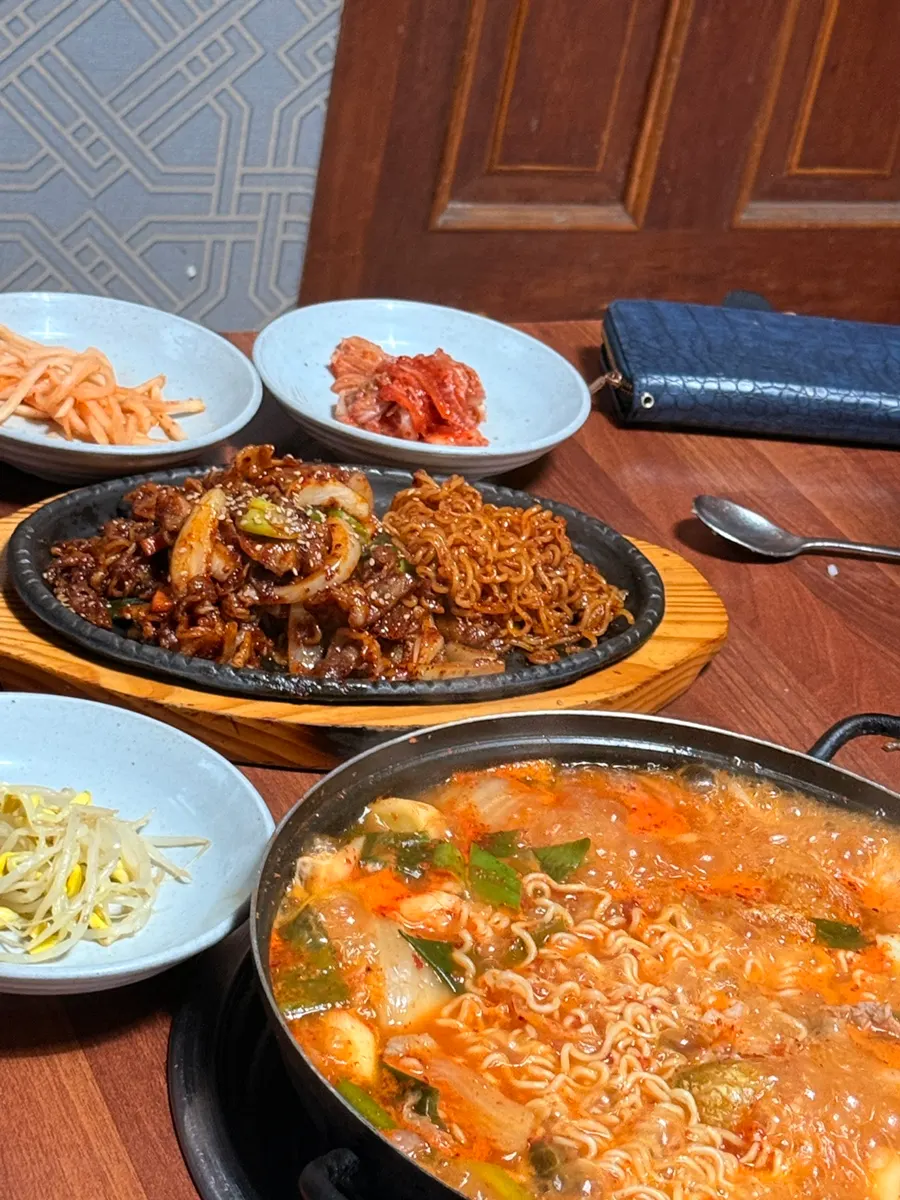 Hearty Korean meal shared by three people