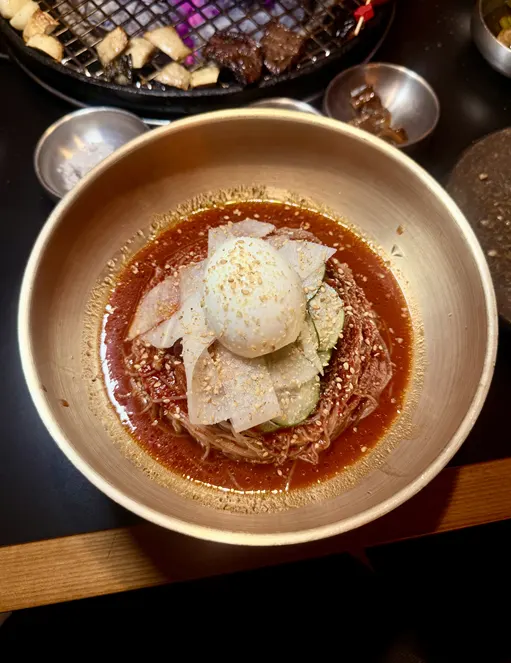 Thin noodles coated in spicy-sweet sauce